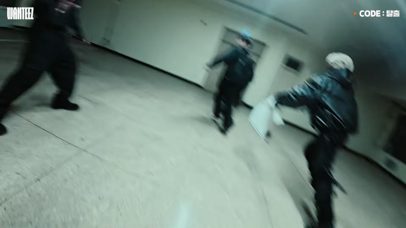 Cinematic lighting and high-contrast shadows highlighting the mystery theme of the latest ATEEZ content.