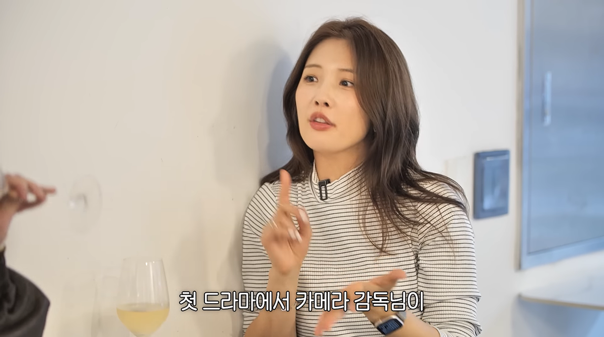 Nam Jihyun on Hwang Bora's YouTube channel, looking serious