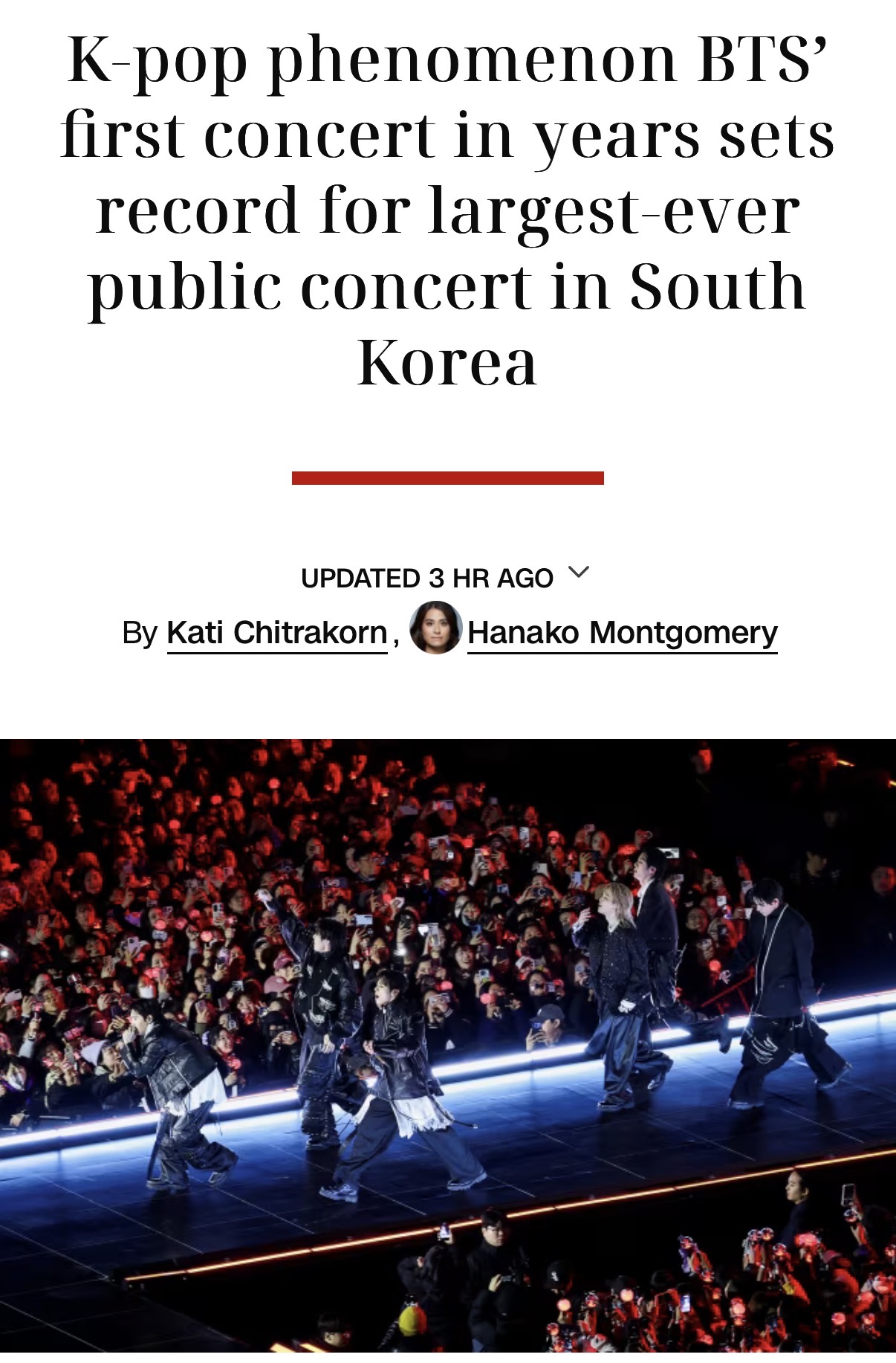 A wide shot of the massive crowd gathered at the BTS Gwanghwamun concert, showing the scale of the attendance.