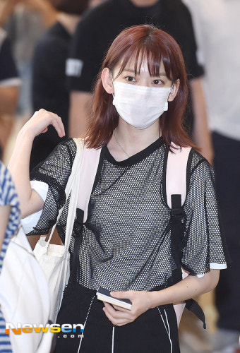 Modern office workers in Seoul showcasing a mix of minimalist and trendy professional styles.