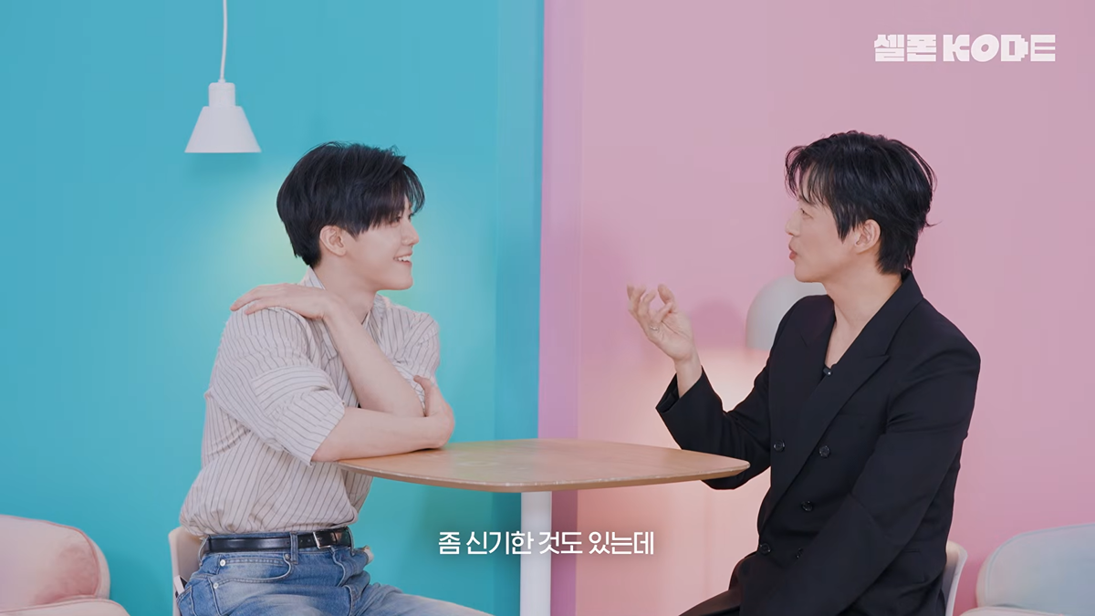 Close up of Jaemin and Namgoong Min laughing together