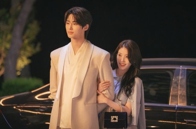 Promotional still of IU and Byeon Woo-seok for their upcoming 2026 drama '21st Century Grand Lady'