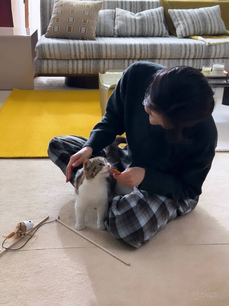 Full body shot of Kim Yuna showcasing her impeccable fashion sense and proportions