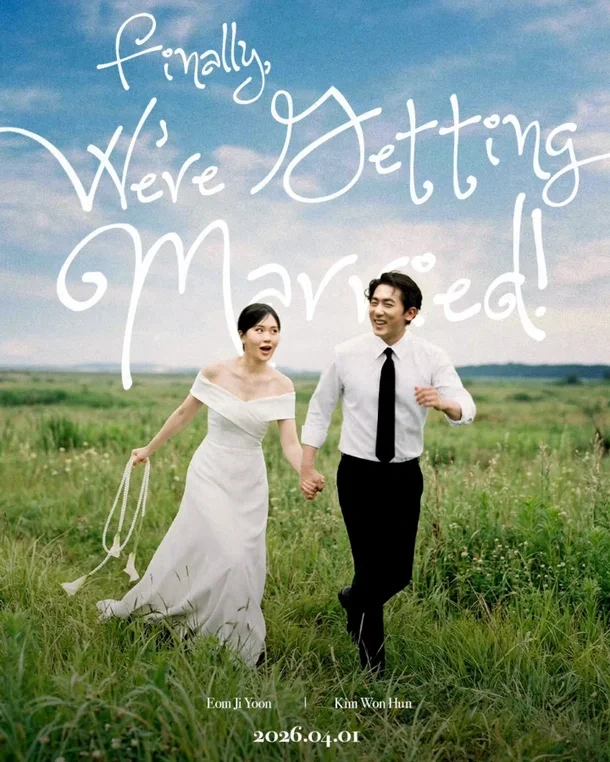 Kim Won-hun and Um Ji-yoon laughing together on a set, showing their natural chemistry