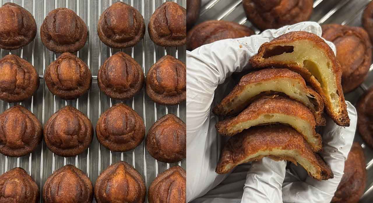 A tray of freshly baked butter tteok with a sprinkle of coconut flakes on top, highlighting the Hawaiian influence.
