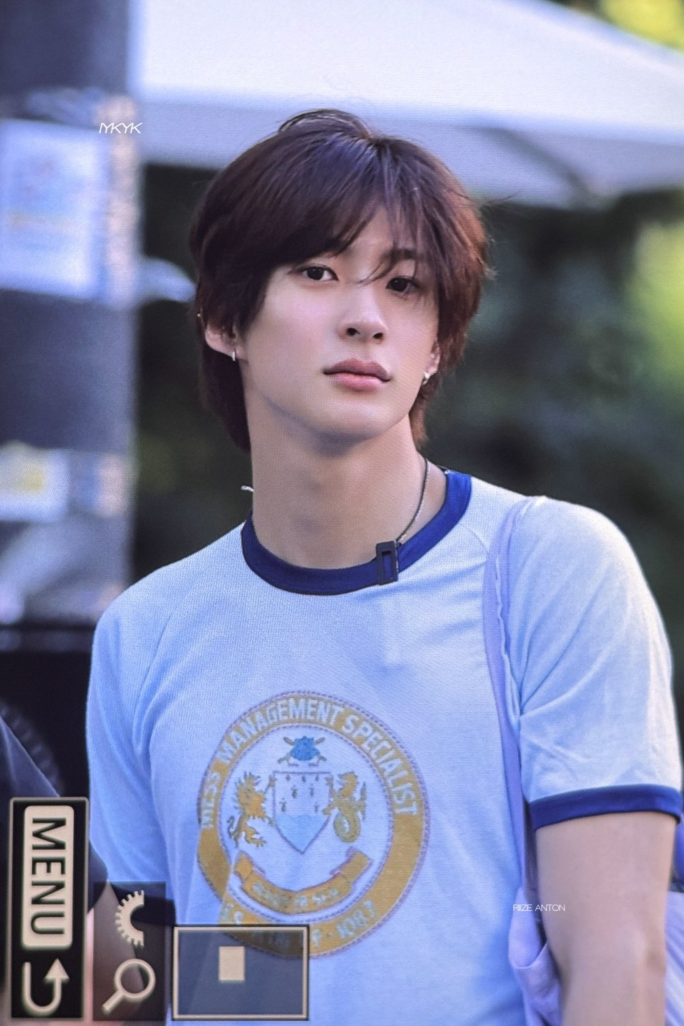 Anton from RIIZE showing off his natural skin texture and messy hair style in South America