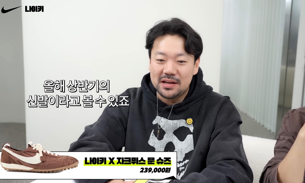 Close up of a person wearing low-profile sneakers with wide leg pants, demonstrating the 2026 Seoul street style.