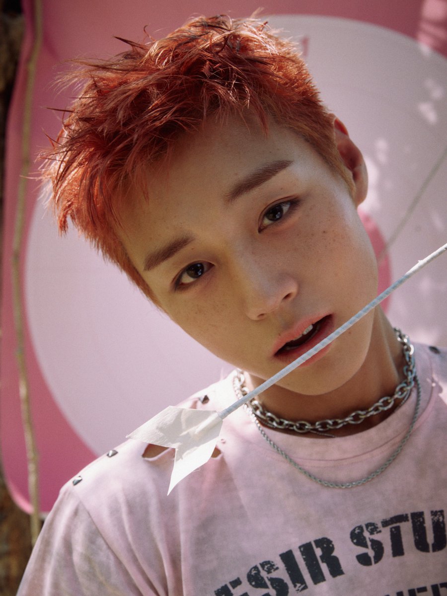 Park Ji Hoon posing in a sophisticated suit for his RE:FLECT concept photo