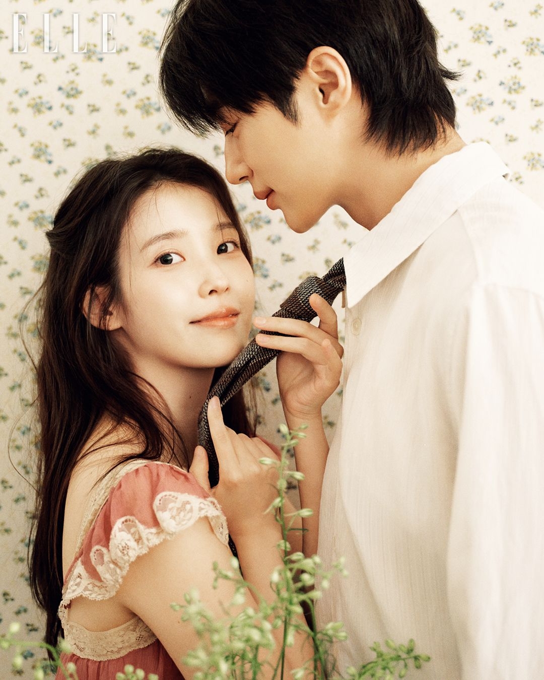 IU in a stunning lace gown, embodying the modern princess aesthetic