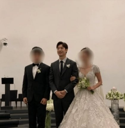 Lee Je-hoon looking sharp in a tailored suit at a 2026 wedding ceremony