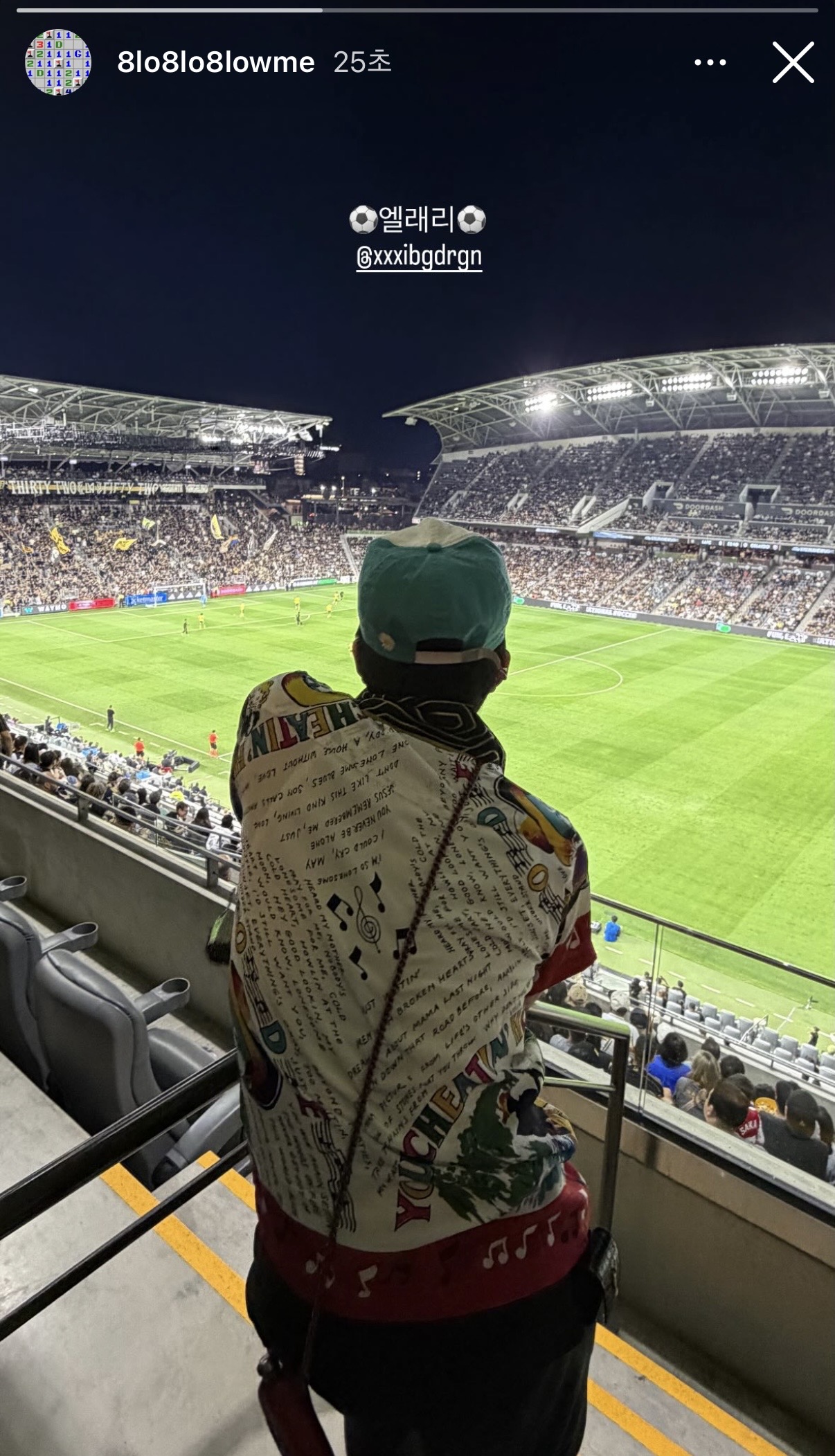 G-Dragon and Daesung spotted in the stands at a stadium in LA looking iconic